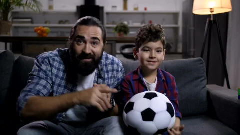 Stock Video Father And Son Watching Sport Live Wallpaper For PC - Free Live Wallpaper