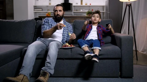 Stock Video Father And Son Watching A Film Live Wallpaper For PC - Free Live Wallpaper