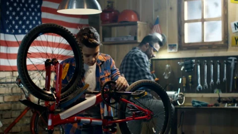 Stock Video Father And Son Repairing A Bike In The Garage Live Wallpaper For PC - Free Live Wallpaper