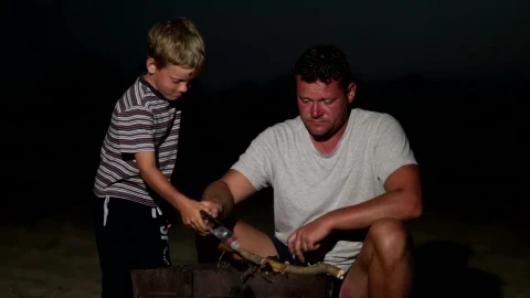 Stock Video Father And Son Lighting A Campfire At Night Live Wallpaper For PC - Free Live Wallpaper