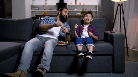 Stock Video Father And Son Laughing At The Tv Live Wallpaper For PC - Free Live Wallpaper