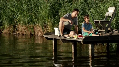 Stock Video Father And Son Having Lunch While Fishing Live Wallpaper For PC - Free Live Wallpaper