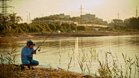 Stock Video Father And His Son Fishing On The Shore Of A Live Wallpaper For PC - Free Live Wallpaper