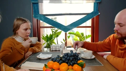Stock Video Father And Her Daughters Drinking Coffee And Juice Live Wallpaper For PC - Free Live Wallpaper