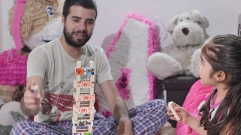 Stock Video Father And Daughter Playing Fun Making A Tower With Chips Live Wallpaper For PC - Free Live Wallpaper