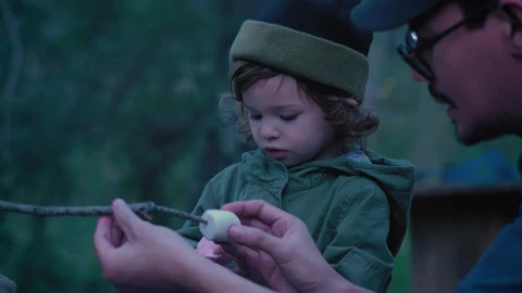 Stock Video Father And Daughter Placing Marshmallows On A Branch Outdoors Live Wallpaper For PC - Free Live Wallpaper