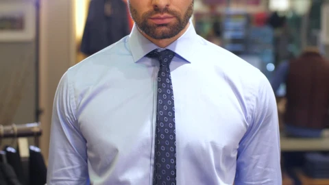 Stock Video Fashion Man Tries On A Suit In The Store Live Wallpaper For PC - Free Live Wallpaper