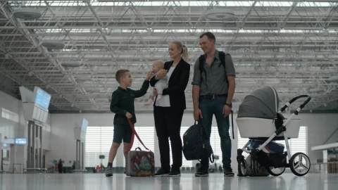 Stock Video Family With Their Two Kids At An Airport Live Wallpaper For PC - Free Live Wallpaper