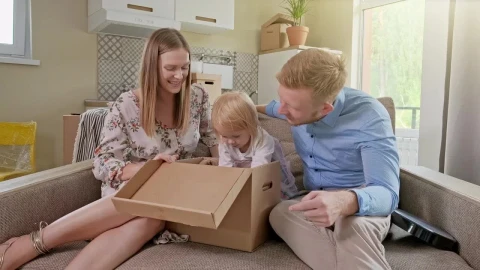 Stock Video Family Unpacking When Moving Into Their New Home Live Wallpaper For PC - Free Live Wallpaper