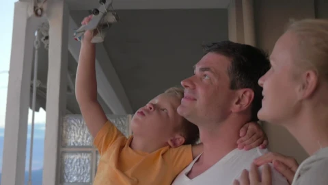 Stock Video Family Standing On A Hotel Balcony Live Wallpaper For PC - Free Live Wallpaper