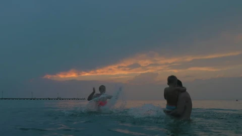 Stock Video Family Splashing Out In The Ocean Live Wallpaper For PC - Free Live Wallpaper