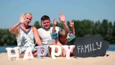 Stock Video Family Sitting Together On The Beach Live Wallpaper For PC - Free Live Wallpaper