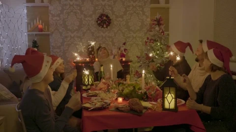 Stock Video Family Sings And Waves Sparklers At Holiday Dinner Live Wallpaper For PC - Free Live Wallpaper