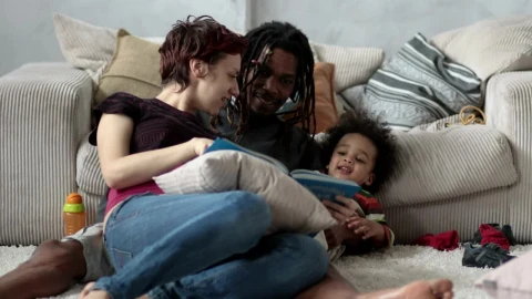 Stock Video Family Reading A Story On The Floor Live Wallpaper For PC - Free Live Wallpaper