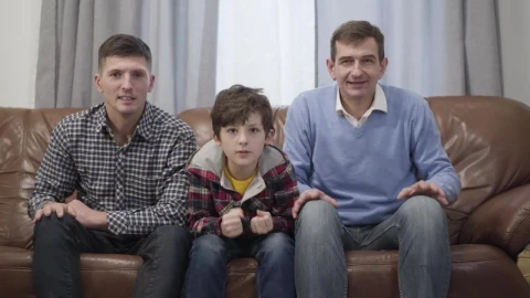 Stock Video Family Of Football Fans Cheer On Sofa Watching Game Live Wallpaper For PC - Free Live Wallpaper