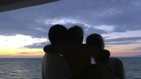 Stock Video Family Looking Out Over The Sea At Dusk Live Wallpaper For PC - Free Live Wallpaper