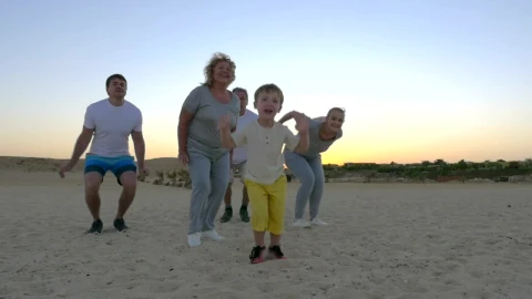 Stock Video Family Jumping At The Beach Live Wallpaper For PC - Free Live Wallpaper