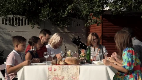 Stock Video Family In A Table Outdoors Praying Before The Meal Live Wallpaper For PC - Free Live Wallpaper