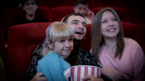 Stock Video Family Enjoying A Movie At The Cinema Live Wallpaper For PC - Free Live Wallpaper