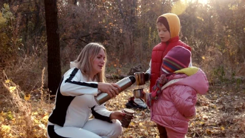 Stock Video Family Drinking Tea In An Autumn Forest Live Wallpaper For PC - Free Live Wallpaper