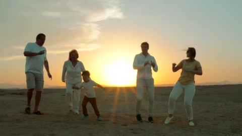Stock Video Family Dancing At The Beach During Sunset Live Wallpaper For PC - Free Live Wallpaper