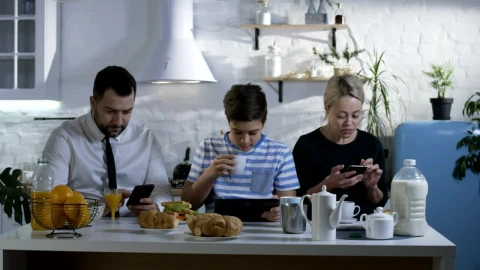Stock Video Family At Breakfast Watching Their Smartphones Live Wallpaper For PC - Free Live Wallpaper