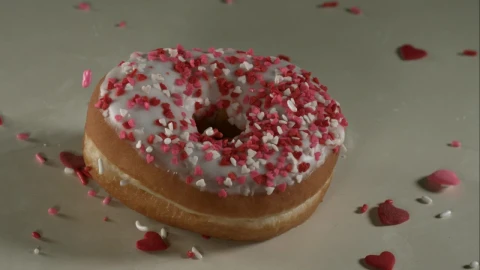 Stock Video Falling Sweet Decorations Into The Doughnut Live Wallpaper For PC - Free Live Wallpaper