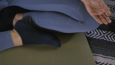 Stock Video Hands And Legs Of A Woman When Meditating In Yoga Live Wallpaper For PC - Free Live Wallpaper