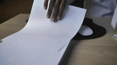 Stock Video Hand Of A Person Taking A Blank Sheet Of Paper Live Wallpaper For PC - Free Live Wallpaper