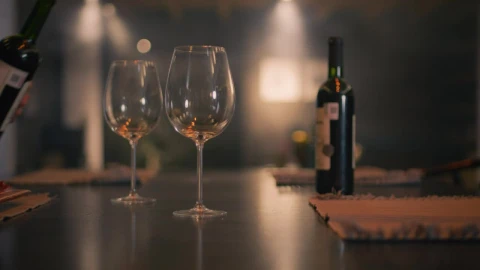 Stock Video Hand Of A Person Serving Wine In Two Glasses Live Wallpaper For PC - Free Live Wallpaper