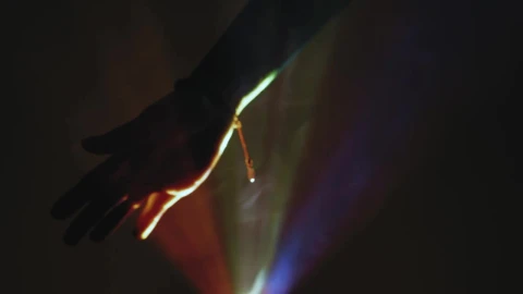 Stock Video Hand Of A Person In The Dark Through Colored Lights Live Wallpaper For PC - Free Live Wallpaper