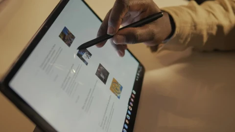 Stock Video Hand Of A Man Browsing The Internet On A Tablet Live Wallpaper For PC - Free Live Wallpaper