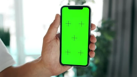 Stock Video Hand Holding Mobile Phone With Greenscreen Live Wallpaper For PC - Free Live Wallpaper
