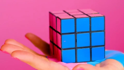 Stock Video Hand Holding A Rubik Cube That Seems To Melt On Live Wallpaper For PC - Free Live Wallpaper