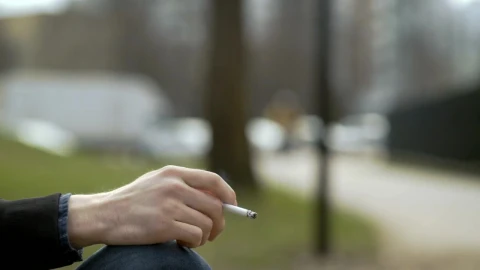 Stock Video Hand Holding A Cigarette Live Wallpaper For PC - Free Live Wallpaper