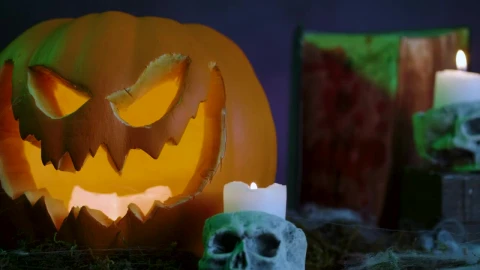 Stock Video Halloween Pumpkin With Cobwebs Candles Gravestones And Smoke Around Live Wallpaper For PC - Free Live Wallpaper