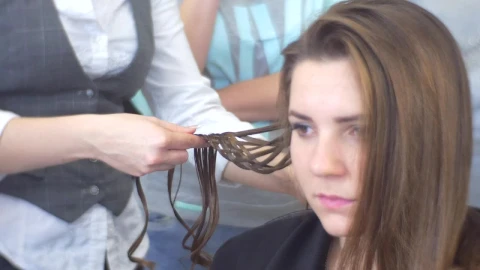 Stock Video Hairstylist Weaving A Bread In A Model Live Wallpaper For PC - Free Live Wallpaper