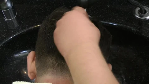 Stock Video Hairdresser Washing A Clients Hair Live Wallpaper For PC - Free Live Wallpaper