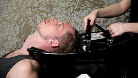 Stock Video Hairdresser Washing A Mans Hair Live Wallpaper For PC - Free Live Wallpaper