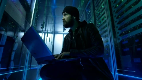Stock Video Hacker Sitting On The Ground Of Data Center Live Wallpaper For PC - Free Live Wallpaper