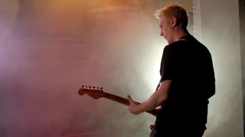 Stock Video Guitarist Playing Guitar On A Smoky Stage Live Wallpaper For PC - Free Live Wallpaper