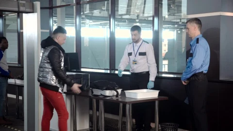 Stock Video Guard Inspecting A Passenger Bag At The Airport Live Wallpaper For PC - Free Live Wallpaper