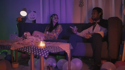 Stock Video Group Of Friends Chatting At A Halloween Costume Gathering Live Wallpaper For PC - Free Live Wallpaper