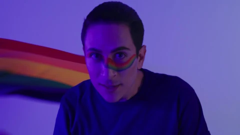 Stock Video Gay Man Playing With Lgbt Pride Flag Live Wallpaper For PC - Free Live Wallpaper