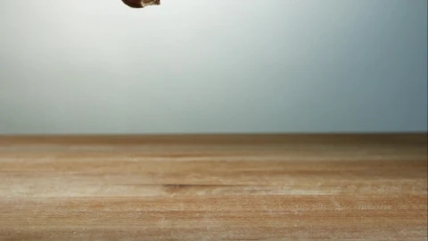 Stock Video Garlic Pieces Falling To The Table In Slow Motion Live Wallpaper For PC - Free Live Wallpaper