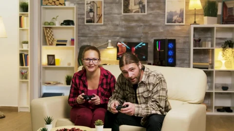 Stock Video Gaming Couple Jump Up To Celebrate Victory Live Wallpaper For PC - Free Live Wallpaper