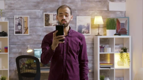 Stock Video Future Man Uses Mobile Voice Input To Turn Off Lights Live Wallpaper For PC - Free Live Wallpaper