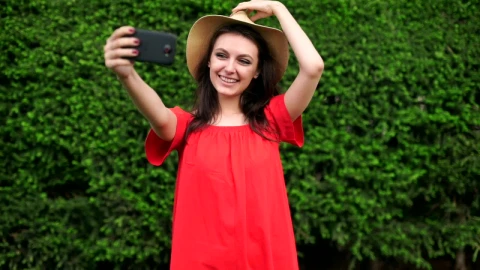 Stock Video Funny Girl Taking Selfies Wearing A Red Dress Live Wallpaper For PC - Free Live Wallpaper