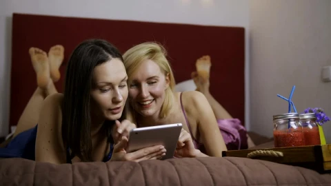 Stock Video Funny Friends At Home While Using A Tablet Live Wallpaper For PC - Free Live Wallpaper