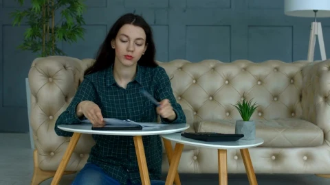 Stock Video Frustrated Woman Throws Paperwork On The Floor Live Wallpaper For PC - Free Live Wallpaper